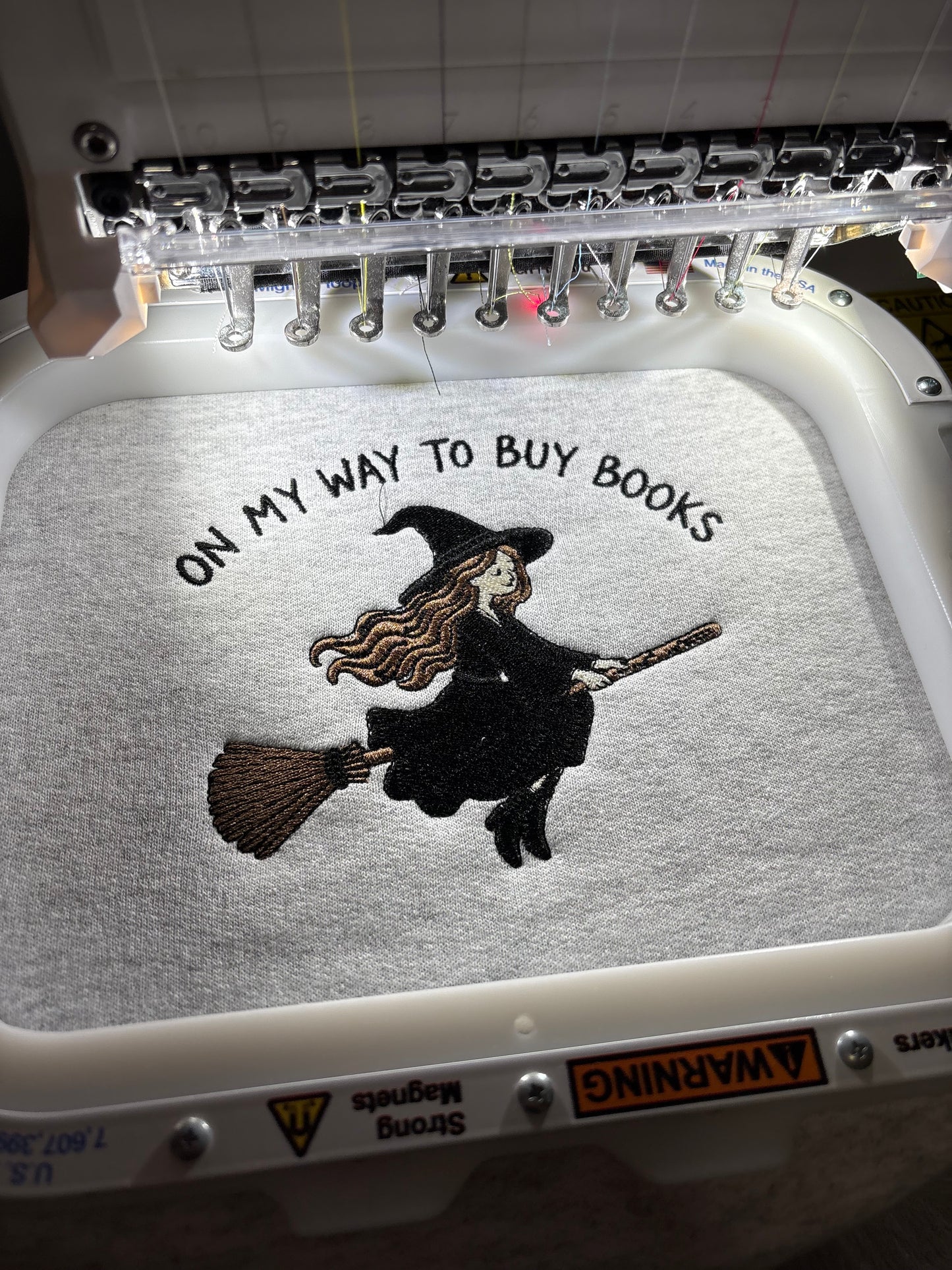 Off To Buy Books Embroidered Sweatshirt