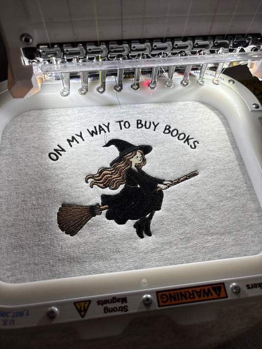 Off To Buy Books Embroidered Sweatshirt